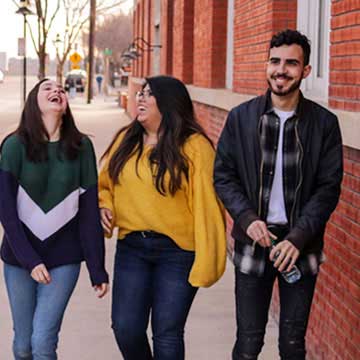 3 students walking